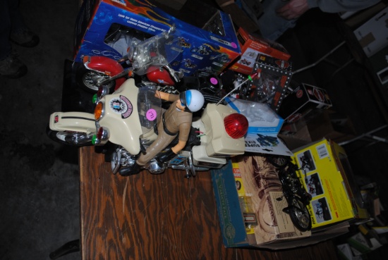 2 Boxes including motorcyle toys (Harley & American Chopper), and police bike