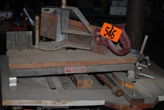 Wood cart on wheels, table saw on stand, mitre saw, tool box, tie rod assembly