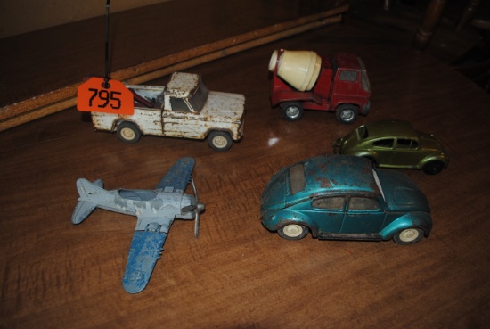 Tonka tow truck, Tonka "Bug" car, Marx cement truck, plastic "Bug" car, Hubley airplane