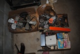 Old roller skates, old metal fans, home shoe shine kit, old iron, stove stoker, hair stuff, clippers