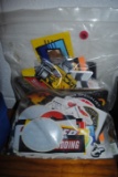 Bag with assorment of racing stickers, magnets, other misc. commemorative buttons