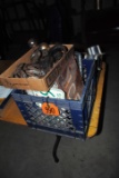 Crate of misc. license plates, 1 Le Sueur Fire Department sign, box of trailer balls, tow hooks, 1 b