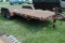 2000 SKL Flatbed Trailer with manual tilt bed, tandem axle, 77