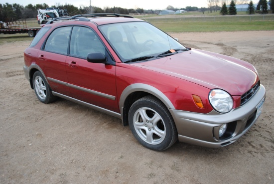 2003 Subaru Impreza AWD, 4-door, cloth interior, small dent in hood, manual transmission, drove it i