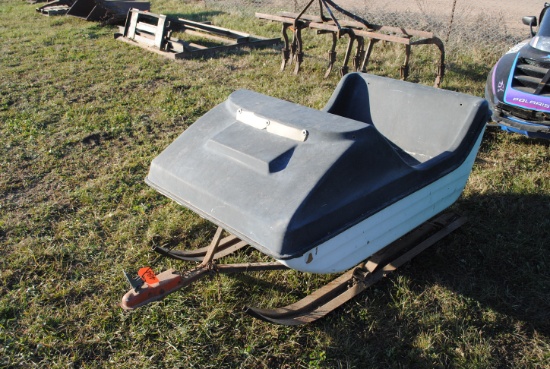 Pull-behind sled