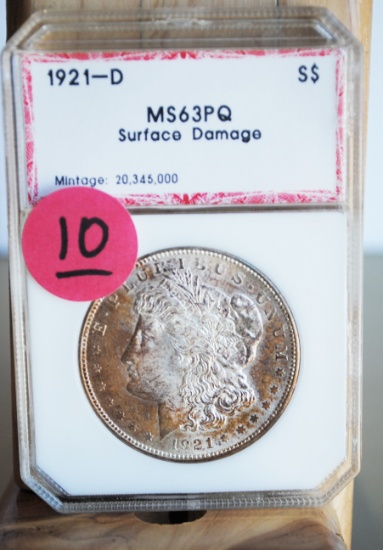 1921 Morgan Dollar, 'D', PCI graded, MS63PQ, some surface damage, russet toning