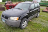 **T** 2002 Ford Escape Runs, but bad tranny, 4 dr., V-6 cloth interior, 2 sets of keys, mileage show