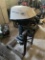 Johnson outboard motor with stand; 6hp; has reverse; tiller type