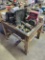 Wood shop table with contents - Briggs and Stratton 8hp, pull start and other engine, engine parts,