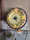 AC Fire Ring Spark Plugs plastic lighted clock; has been repaired; lights up, unknown if clock works