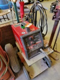 Lincoln Electric wire feed welder model SP-135T; on cart; with roll of wire inside