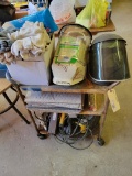 Metal cart with contents - shop lights, oil absorbent mats, welding safety shields, shop gloves, all