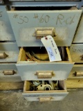 Roller chain, battery replacement cables, used bearings for machinery. This lot is 3 drawers of cabi