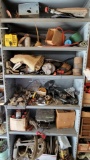 All contents of shelf (not included) - old oil can, control cable, canvas pieces,