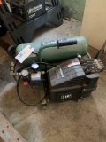 Hitachi portable air compressor; 2hp Model EC12 110V max 125 psi 4 gallon tank capacity