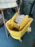 Plastic mop bucket with mop head