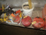 Assortment of McCulloch and other chainsaw parts, carrying case, assorted oils, gas cans