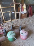 Two wheel hand truck and metal gas and diesel cans