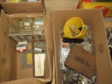 Boxes of plumbing supplies, garden hose nozzles, hinges, metal brackets, electrical parts, rotary bo