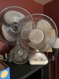 Electric table top fans and one clip on fan