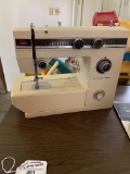 Montgomery Ward open arm sewing machine, no cord, Lot also includes sewing machine cabinet and stora