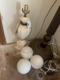 Floor and table top lamps, globes, all in corner