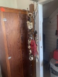 Wood coat rack with horse harness items - Jim Dandy buckles, bells, horse hair tassels and more