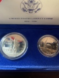 United States Liberty Coins 1986 commemorative set with 1 dollar and half dollar coins, Lot also inc