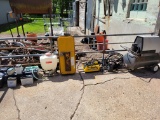 Air compressor, backpack sprayer, Koehring gas tank, batteries, assorted scrap metal