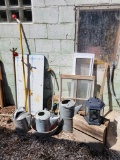 Blue and white enamel table top section, Rain Bird garden sprinkler, metal watering cans and more