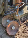 Steering wheels - Chevrolet and other; rusted tire rims with aluminum Whippet hub cap