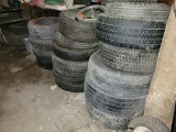 Assorted used tires; some with rims; various sizes, Lot is located down middle of building