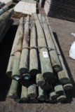 Approximately 29 8' long green treated posts, 4