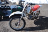 Honda 200XR Dirt Bike, NO TITLE, 1994?, owner states it was driven into his yard but it's been sitti
