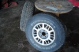 1 Goodyear and 1 Firestone P235/75R15 tires on 5-bolt rim, off of S10 or Sonoma