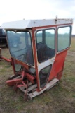 Hiniker tractor cab with brackets, some broken glass