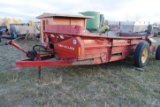 New Holland 165 Manure Spreader, poly floor, slop gate, some rusting through