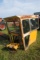 Tractor cab, broken back window
