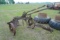 John Deere 2-14 pull-type plow on steel