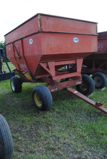J&M Gravity Box on Kewanee #47 running gear, approximately 200+/- bushels, spring loaded pole