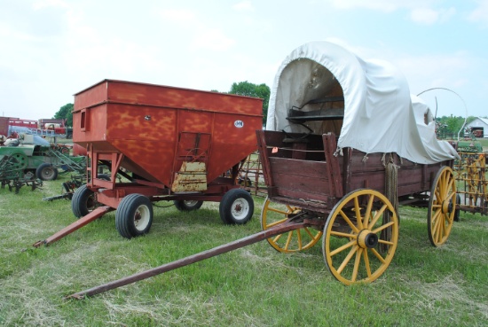 Covered wagon, measures 14.5" by 41" wide, wood spoke wheels, one seat