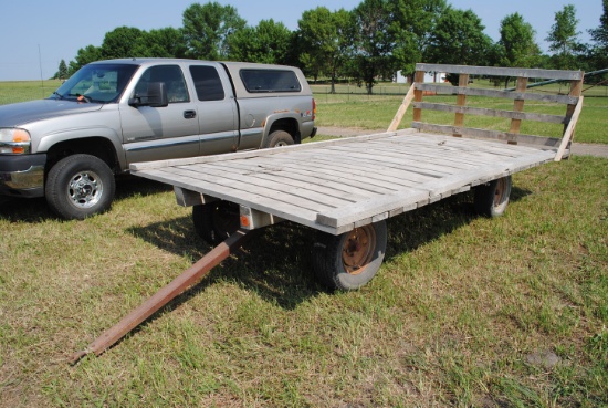8'x17' Hay Rack on 4-wheel running gear, has white oak rough sawn lumber