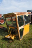 Tractor cab, broken back window