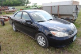 2003 Toyota Camry, 4-door, cloth interior, power windows/locks, remote start, 2.4L engine, driven in