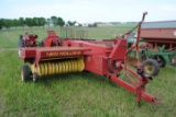 New Holland 310 with New Holland 54A kicker, owner states it works good