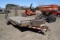 **T** 2012 Load Trail Skidsteer Trailer, fenders, tandem axle, 8-bolt wheels, flip down ramps, 7' wi