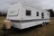 **T** 1999 Hornet Bumper pull Camper 29'x8', Queen bed in master, couch folds down into bed, dinette