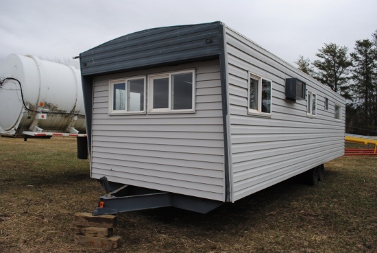 10'x33' Job Trailer, 2-5/16" ball, sliding end door, "heat & air worked last time used & electric wo