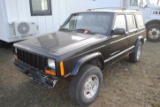**T**  2000 Jeep Cherokee Sport 4x4, 4-door, cloth interior, 4L engine, automatic, tow hitch on both