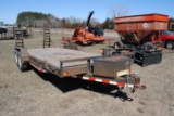 **T** 2012 Load Trail Skidsteer Trailer, fenders, tandem axle, 8-bolt wheels, flip down ramps, 7' wi